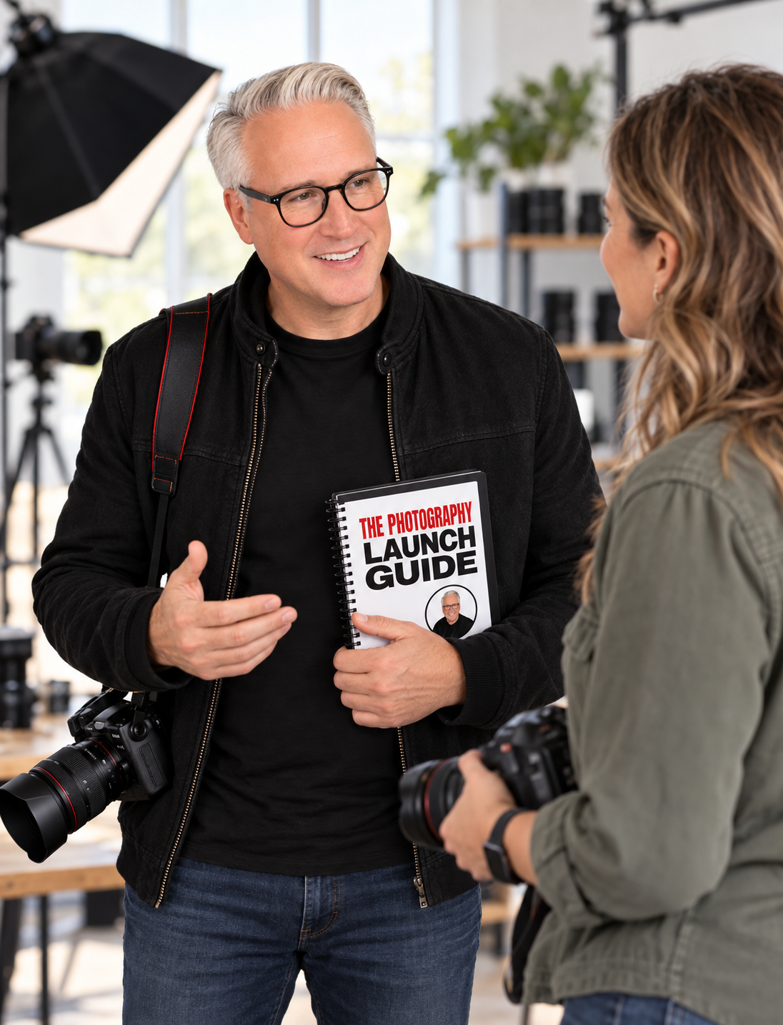 Scott Proposki sharing the Photography Launch Guide with a student in his studio